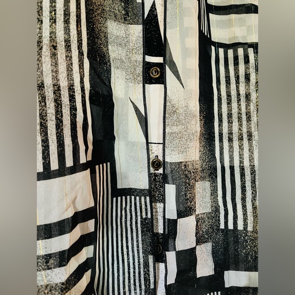 Oversized blouse, pit to pit is 22”, however, the tag is ripped half off. - Picture 4 of 4